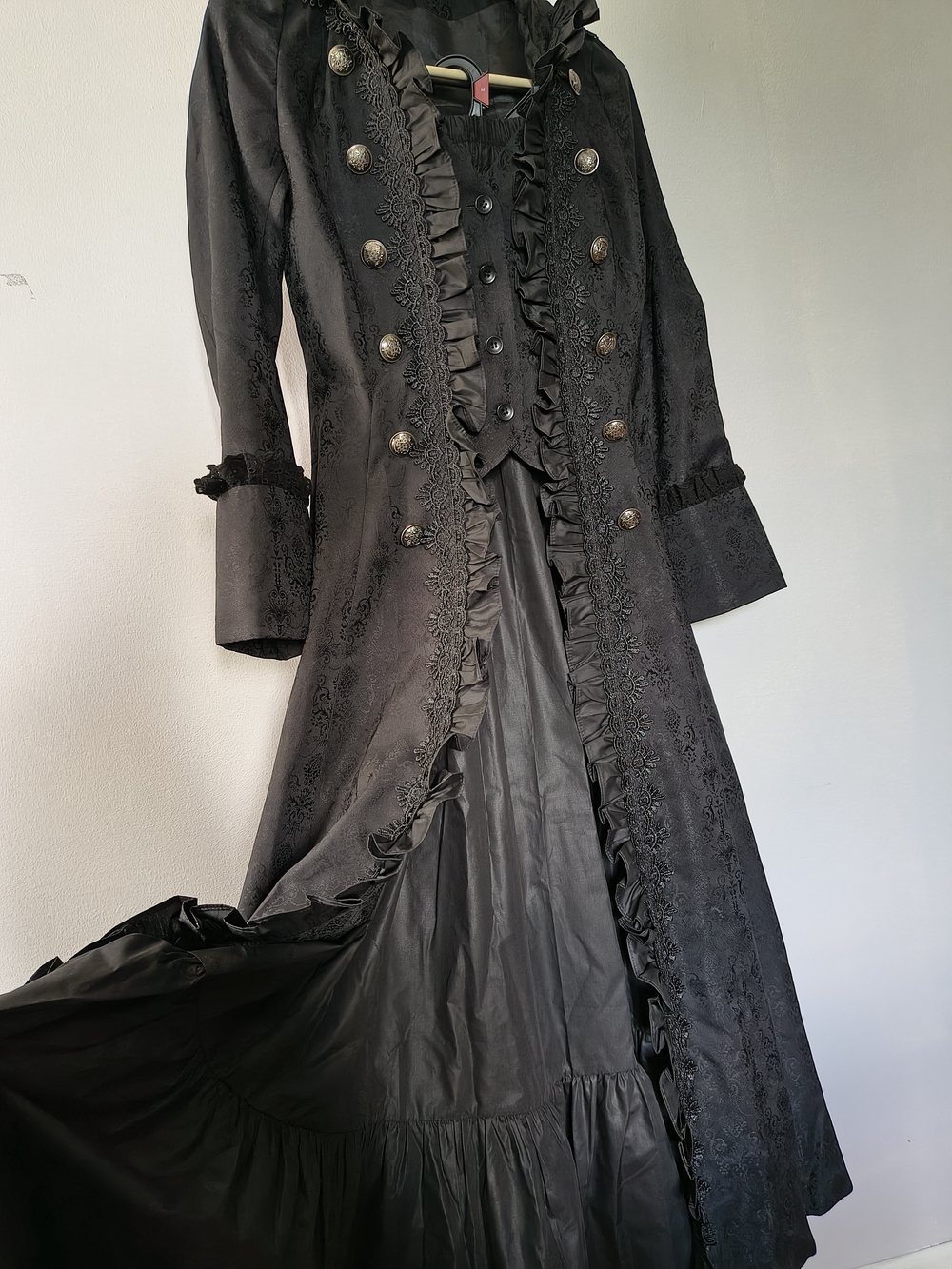 Elegant Black Women's Long Coat with Ruffle Trim and Collar